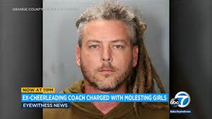 Former California high school cheerleading coach charged with molesting 6 girls